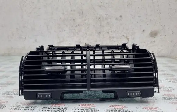 Dash center air vent grill