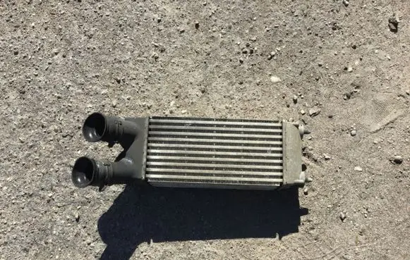 Citroen Berlingo Intercooler radiator 9682434580