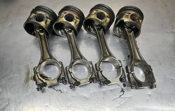 Volkswagen Golf V Piston with connecting rod 11R0