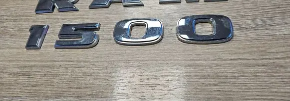 Ram 1500 Front door emblem/model letters 