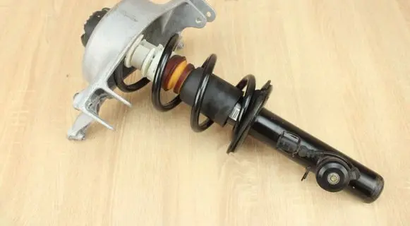 Audi A5 8T 8F Front shock absorber with coil spring 8F0413029B