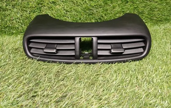 KIA Soul Dash center air vent grill 97410B2000