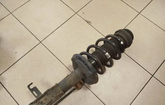 Opel Zafira C Front shock absorber with coil spring