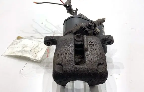 Volkswagen PASSAT B7 Rear brake caliper 