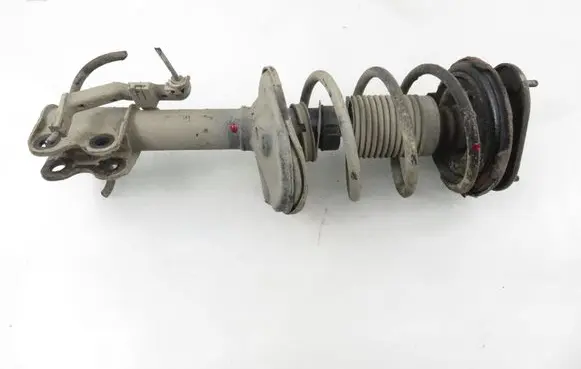 Toyota Corolla E110 Front shock absorber with coil spring 