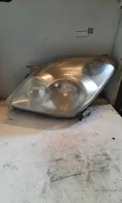 Toyota Corolla Verso E121 Headlight/headlamp 9922679004