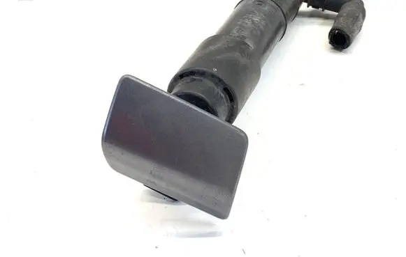 Volkswagen Golf V Headlight washer spray nozzle 