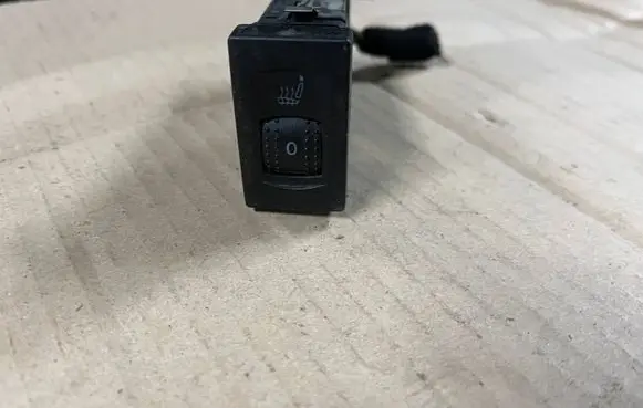 Seat heating switch