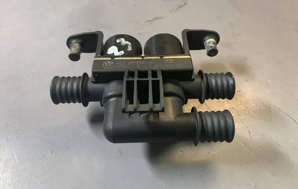 Coolant heater control valve