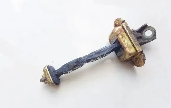 Nissan Almera N16 Rear door check strap stopper