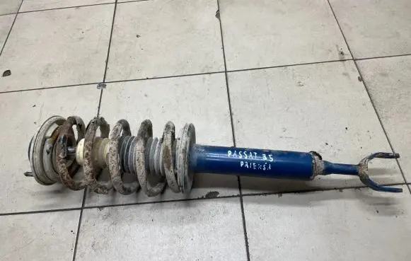 Volkswagen PASSAT B5 Front shock absorber with coil spring
