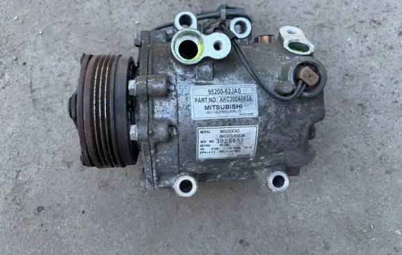 Suzuki Swift I Air conditioning (A/C) compressor (pump) 9520062JA0 AKC201A083A 3025651