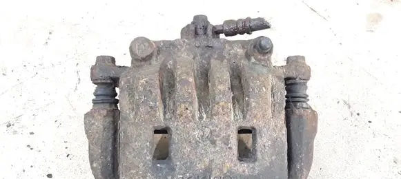 Subaru Impreza III Front brake caliper