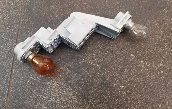 Volvo V50 Tail light bulb cover holder 28127002