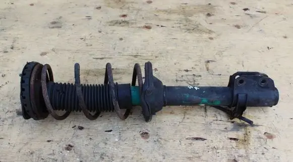 Subaru Forester SF Front shock absorber with coil spring STURBO
