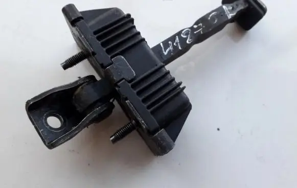 Mazda 626 Rear door check strap stopper