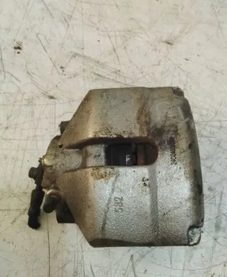 Volkswagen Golf VI Front brake caliper