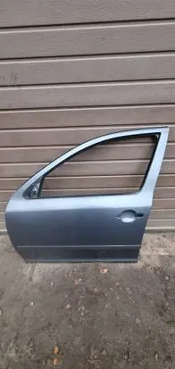 Skoda Octavia Mk2 (1Z) Front door 1z0831311