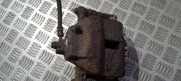 Nissan Almera N16 Front brake caliper