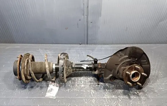 Subaru Legacy Front shock absorber with coil spring