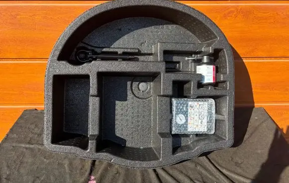Toyota Yaris Cross Spare wheel section trim 649930D060