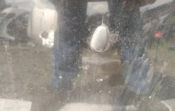 Windshield washer spray nozzle