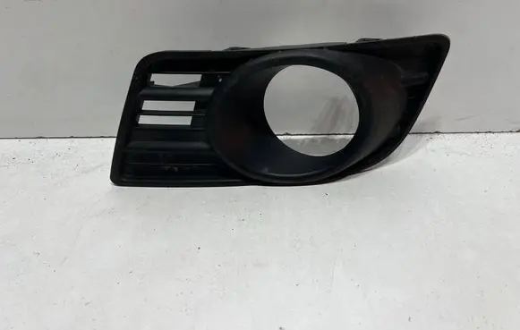 Suzuki Swift I Front fog light trim/grill 7176172KIL