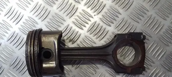 Piston with connecting rod