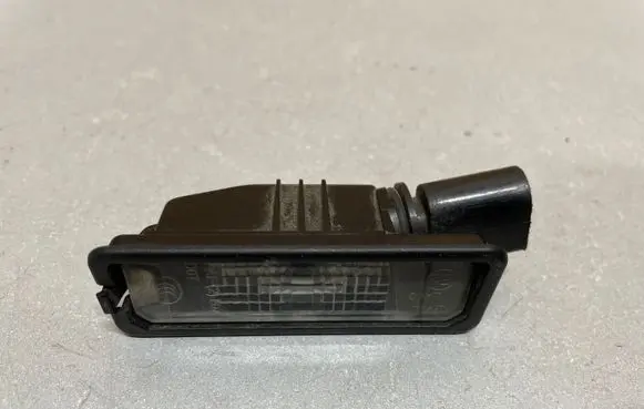 Volkswagen Golf VI Number plate light 1K8943021