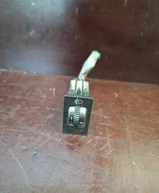 Headlight level height control switch