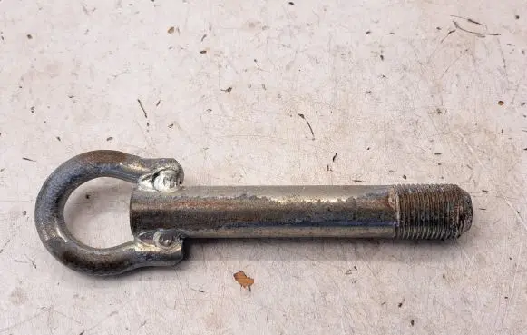 Towing hook eye