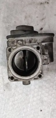 Volkswagen Golf V Throttle valve 038128063C