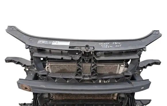 Radiator support slam panel