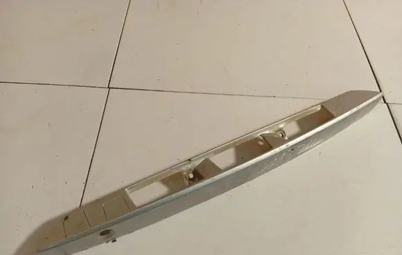 Mazda 323 F Trunk door license plate light bar BVEGB0811
