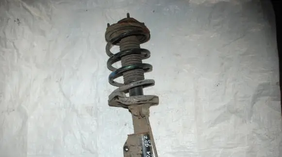 Mazda 323 Front shock absorber with coil spring