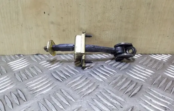 Ford Fusion Rear door check strap stopper