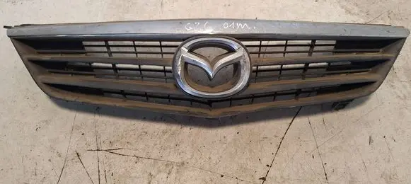 Mazda 626 Front bumper upper radiator grill GG2M50712