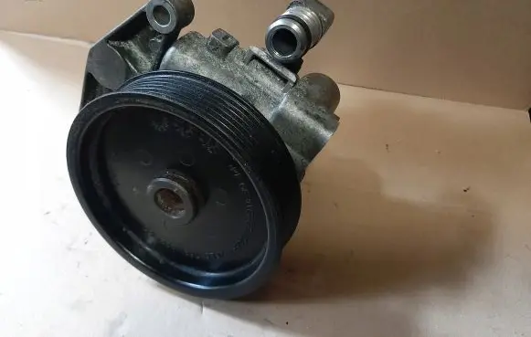 Mercedes-Benz E C207 W207 Power steering pump A0054669501