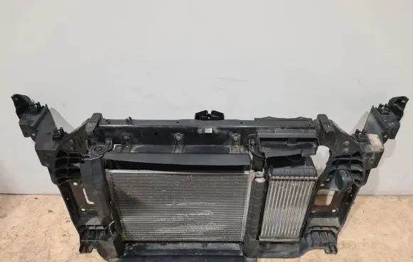 Radiator support slam panel