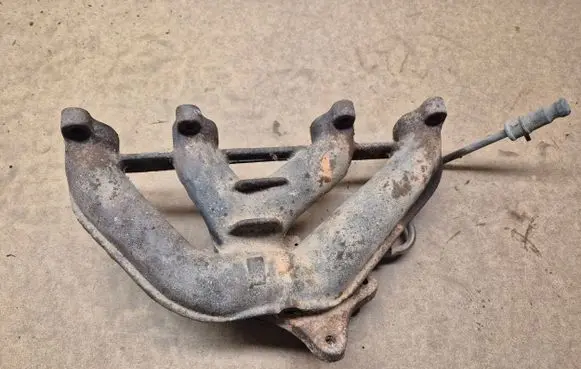 Volkswagen Golf II Exhaust manifold 037253033