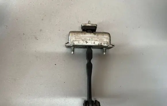 Opel Corsa E Front door check strap stopper