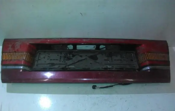Trunk door license plate light bar
