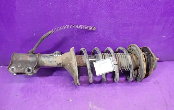 Front shock absorber with coil spring