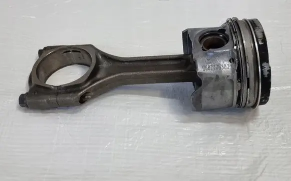 Opel Astra K Piston with connecting rod 55577553