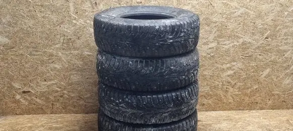 Opel Frontera B R15 winter/snow tires with studs 