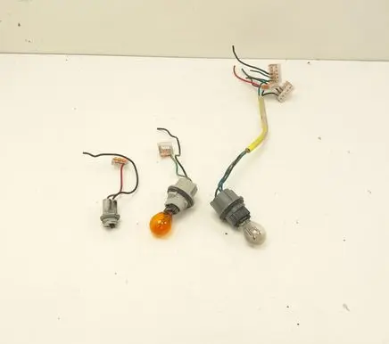 Toyota Tundra II Tail light bulb cover holder 93874518 93874516
