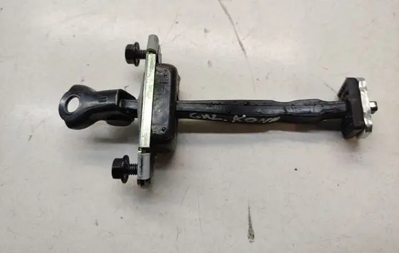 Rear door check strap stopper