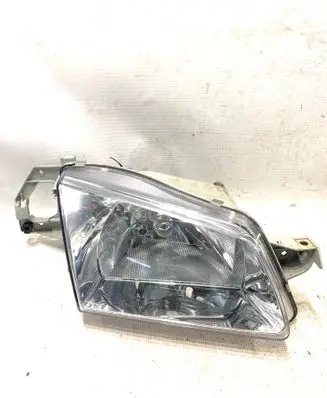 Mazda 323 Headlight/headlamp 205571B