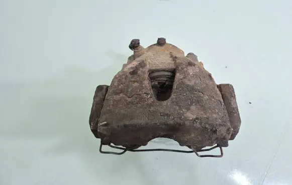 Opel Combo C Front brake caliper 