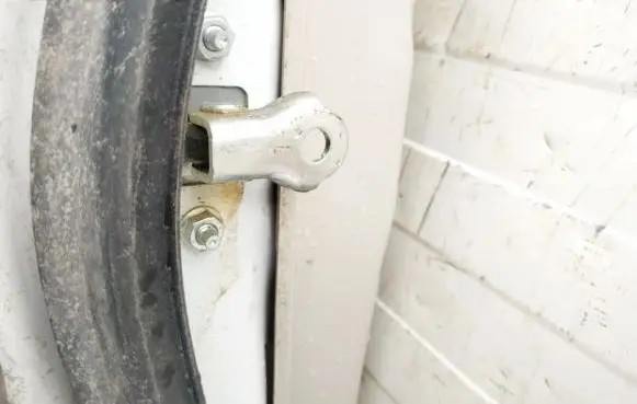 Rear door check strap stopper